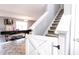 Stairwell in home with view to table and chairs at 2550 Cedarmill Dr, Franklin, IN 46131