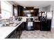 This home features a well-equipped kitchen, complete with modern appliances and plenty of counter space at 2550 Cedarmill Dr, Franklin, IN 46131