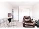 Cozy living room with comfortable seating, wood flooring and an American flag hanging on the wall at 2550 Cedarmill Dr, Franklin, IN 46131