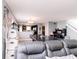 Spacious living area featuring an adjacent dining area and staircase at 2550 Cedarmill Dr, Franklin, IN 46131