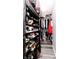Large walk-in closet with custom shelving and organization system for optimal storage at 2550 Cedarmill Dr, Franklin, IN 46131