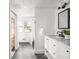 Modern bathroom featuring a walk in shower, large vanity, and shelving at 3936 Graceland Ave, Indianapolis, IN 46208