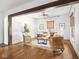 Inviting living room with hardwood floors, stylish decor, and modern lighting at 3936 Graceland Ave, Indianapolis, IN 46208