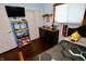 Well-lit bedroom featuring plenty of shelf space, a dresser, and stylish decor at 3942 Senour Rd, Indianapolis, IN 46239