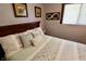 Bedroom with a dark wood bed frame, and matching side tables at 3942 Senour Rd, Indianapolis, IN 46239