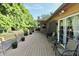 Spacious deck with seating area and decorative plants, ideal for outdoor gatherings at 3942 Senour Rd, Indianapolis, IN 46239