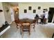 Bright dining room with tile floors and decorative wall art at 3942 Senour Rd, Indianapolis, IN 46239