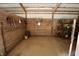 Inside horse stall with tack and tools, ready for your equestrian pursuits, providing a tidy organized space at 3942 Senour Rd, Indianapolis, IN 46239