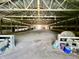 Large indoor riding arena with well-maintained footing, providing ample space for equestrian activities at 3942 Senour Rd, Indianapolis, IN 46239