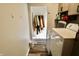 Functional laundry area with a washer and dryer conveniently located near an entryway for everyday ease at 3942 Senour Rd, Indianapolis, IN 46239