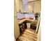 Pantry featuring wooden countertop, storage cabinets, under-cabinet lighting, and beverage cooler at 3942 Senour Rd, Indianapolis, IN 46239
