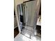 The stainless steel refrigerator is a modern, spacious appliance adding elegance to the kitchen at 3942 Senour Rd, Indianapolis, IN 46239