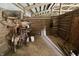 Organized tack room with ample storage for saddles, bridles, and equestrian supplies at 3942 Senour Rd, Indianapolis, IN 46239