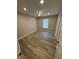 Bedroom featuring hardwood floors, neutral paint, a ceiling fan, and an abundance of natural light at 420 S Hamilton Ave, Indianapolis, IN 46201