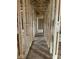 Unfinished hallway featuring exposed wood framing at 420 S Hamilton Ave, Indianapolis, IN 46201