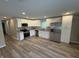 Bright kitchen with stainless steel appliances and ample cabinet space at 420 S Hamilton Ave, Indianapolis, IN 46201