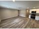 Inviting living room with wood floors, fan and recessed lighting at 420 S Hamilton Ave, Indianapolis, IN 46201