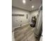 Utility room featuring water heater and connections for laundry and dryer at 420 S Hamilton Ave, Indianapolis, IN 46201