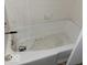 Bathtub featuring dated design and chrome hardware at 4235 Foxglove Trce, Indianapolis, IN 46237