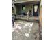 Exterior front entrance featuring a covered porch and weathered wooden steps at 4235 Foxglove Trce, Indianapolis, IN 46237