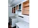 A partially renovated kitchen featuring white cabinets and countertops ready for customization at 4235 Foxglove Trce, Indianapolis, IN 46237