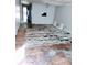 View of an open living space needing new flooring and some TLC at 4235 Foxglove Trce, Indianapolis, IN 46237