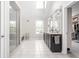 Bright bathroom with dual vanities, walk-in shower, and access to the walk-in closet at 4415 Summer Dr, Zionsville, IN 46077