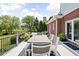 A lovely outdoor deck featuring a dining table with seating and an inviting exterior view at 4415 Summer Dr, Zionsville, IN 46077