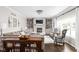 Cozy living room with a fireplace, built-in bookshelves, and stylish furniture at 4415 Summer Dr, Zionsville, IN 46077
