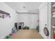 Basement playroom features a toy kitchen, monster truck, and dart board for activities at 4415 Summer Dr, Zionsville, IN 46077