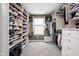 Organized walk-in closet with shelving for shoes, clothes, and accessories at 4415 Summer Dr, Zionsville, IN 46077