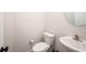 Half bathroom with modern fixtures, white walls, and minimalist decor at 485 Washington St, Fortville, IN 46040