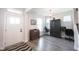 Welcoming entryway area featuring gray floors and access to a study space at 485 Washington St, Fortville, IN 46040