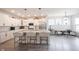 Bright kitchen with stainless steel appliances, a center island, and an open layout at 485 Washington St, Fortville, IN 46040