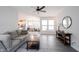Open-concept living room with view into dining and kitchen areas at 485 Washington St, Fortville, IN 46040