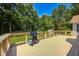 Spacious wood back deck features a barbecue grill for cooking out at 494 W Greencastle Rd, Mooresville, IN 46158