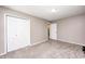 Bedroom with neutral carpet and walls featuring ample closet space at 494 W Greencastle Rd, Mooresville, IN 46158