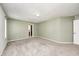 Cozy bedroom with soft carpet, neutral walls, and ample natural light at 494 W Greencastle Rd, Mooresville, IN 46158