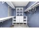 Custom closet offering ample storage space with shelving and drawers at 494 W Greencastle Rd, Mooresville, IN 46158