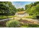 Well-maintained single-story home with a charming exterior and a neatly landscaped yard at 494 W Greencastle Rd, Mooresville, IN 46158