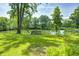 A tranquil pond setting with a wooden dock, perfect for relaxation and enjoying nature at 494 W Greencastle Rd, Mooresville, IN 46158