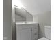 Bathroom with vanity, sink, mirror, and modern fixtures in a clean design at 5209 E North St, Indianapolis, IN 46219