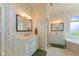 Bright bathroom offering double vanities, a bathtub, and lots of storage space at 5220 Orahood Ct, Plainfield, IN 46168