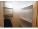 Small walk-in closet with shelving and clothes rod at 5220 Orahood Ct, Plainfield, IN 46168