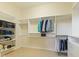 Walk-in closet with custom shelves and clothing racks at 5220 Orahood Ct, Plainfield, IN 46168