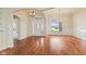 Dining room with hardwood floors, chandelier, and natural light at 5220 Orahood Ct, Plainfield, IN 46168