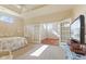 Comfortable main bedroom with an adjacent sitting room featuring glass french doors at 5220 Orahood Ct, Plainfield, IN 46168