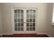 Office with french doors and hardwood floors at 5220 Orahood Ct, Plainfield, IN 46168