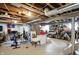 Spacious unfinished basement with exposed beams and ductwork provides ample storage space at 5312 Norwaldo Ave, Indianapolis, IN 46220