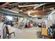 Spacious unfinished basement with storage and stairwell access to the upper level of the house at 5312 Norwaldo Ave, Indianapolis, IN 46220